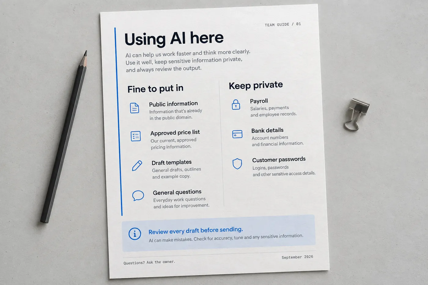 A printed one-page AI use policy lying on a desk, with a short list of allowed and not-allowed items